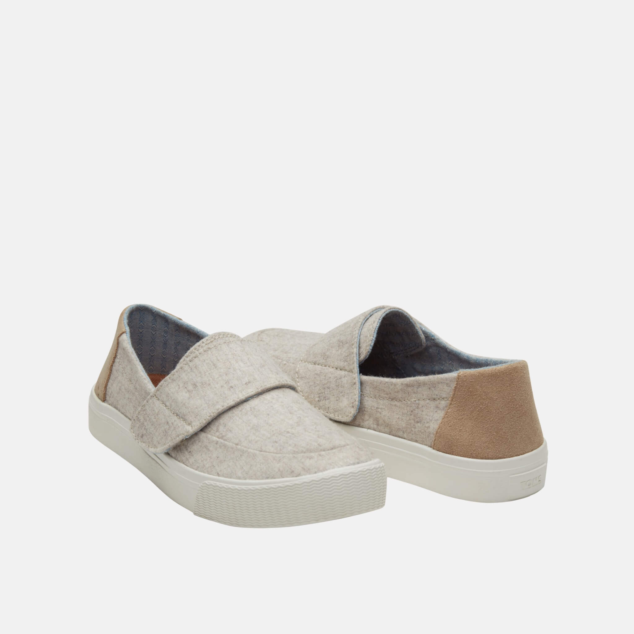 Kremowe damskie wełniane kapcie TOMS Altair Slip-on