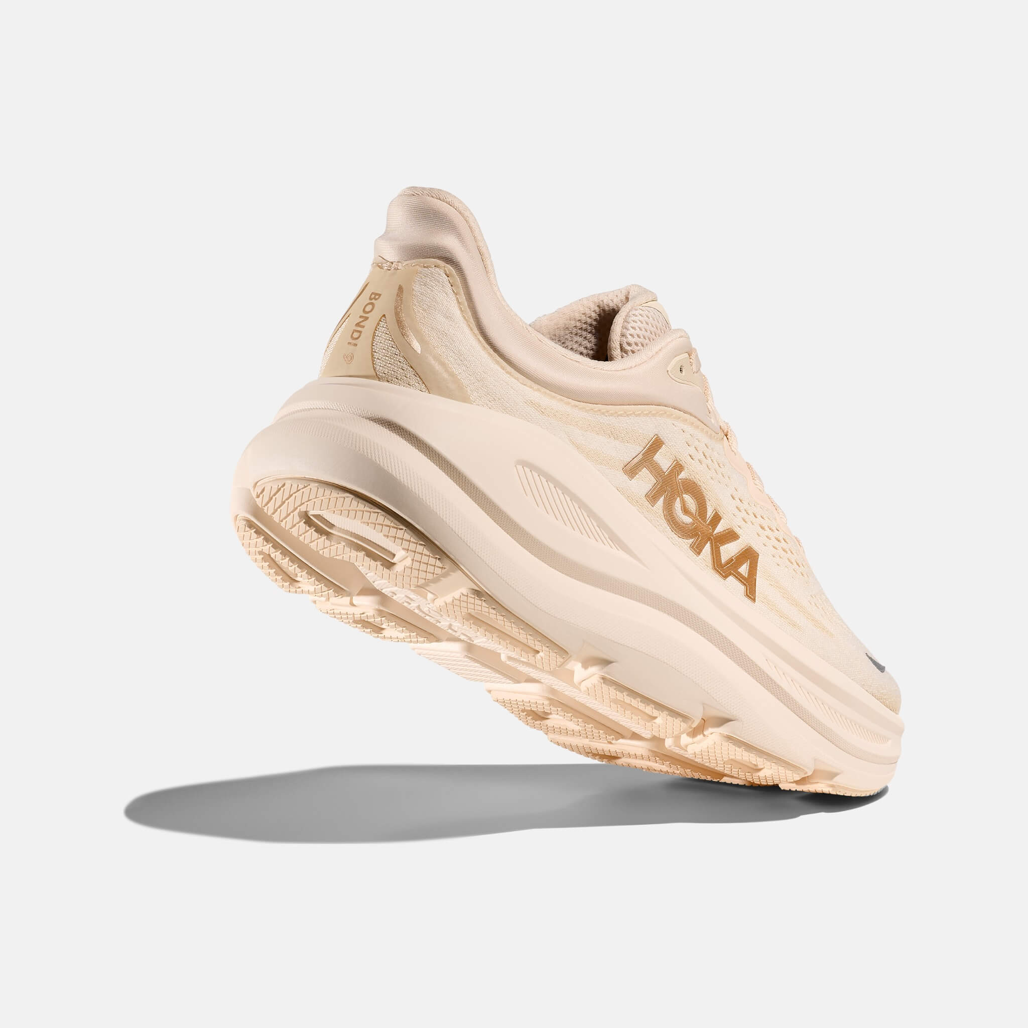 Damskie kremowe sneakersy Hoka Bondi 9