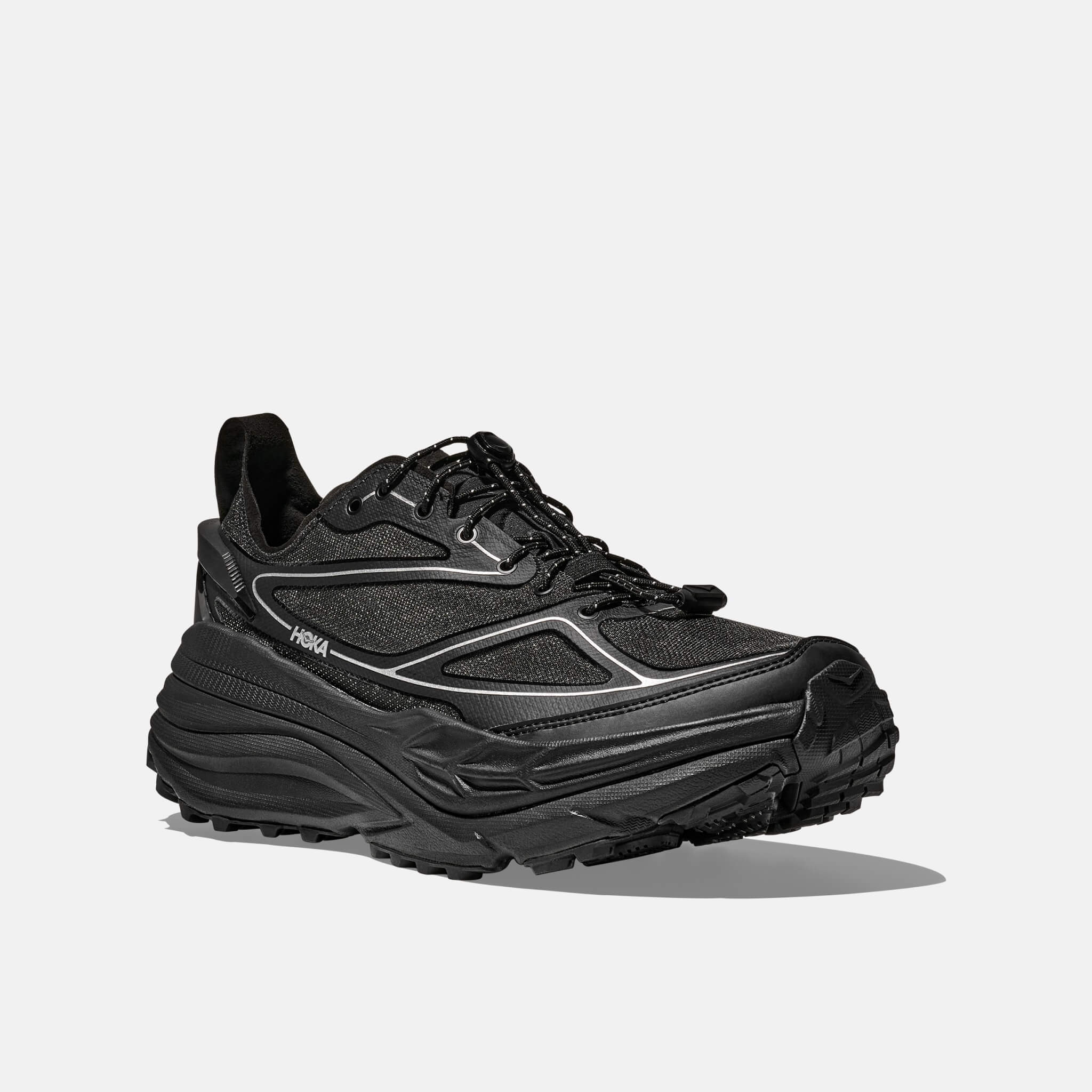 Unisex black and silver Hoka Stinson One7 sneakers