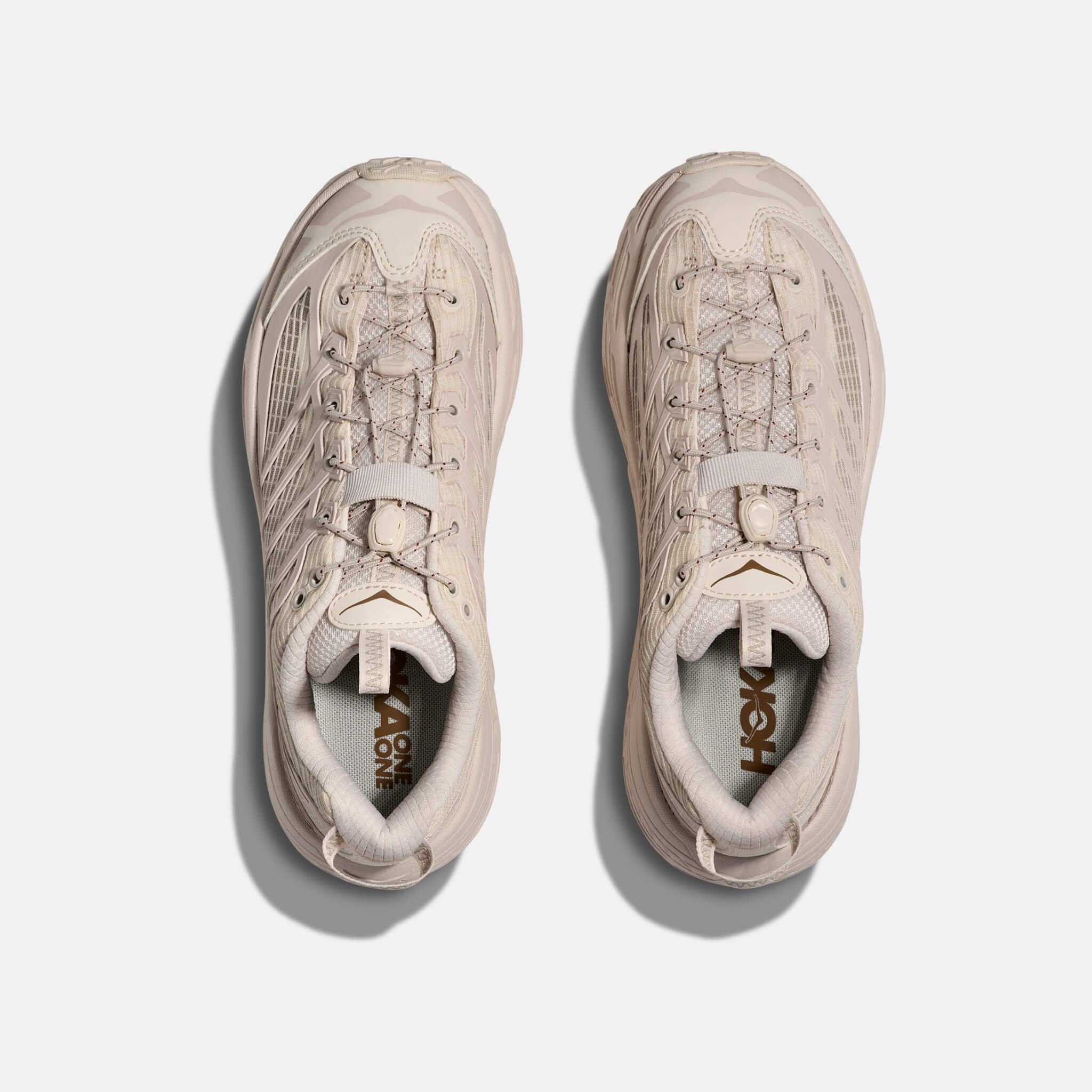 Unisexowe kremowe sneakersy Hoka Mafate Three2 Grid